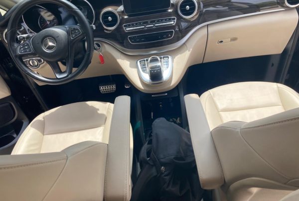 The inside of a black Mercedes minivan