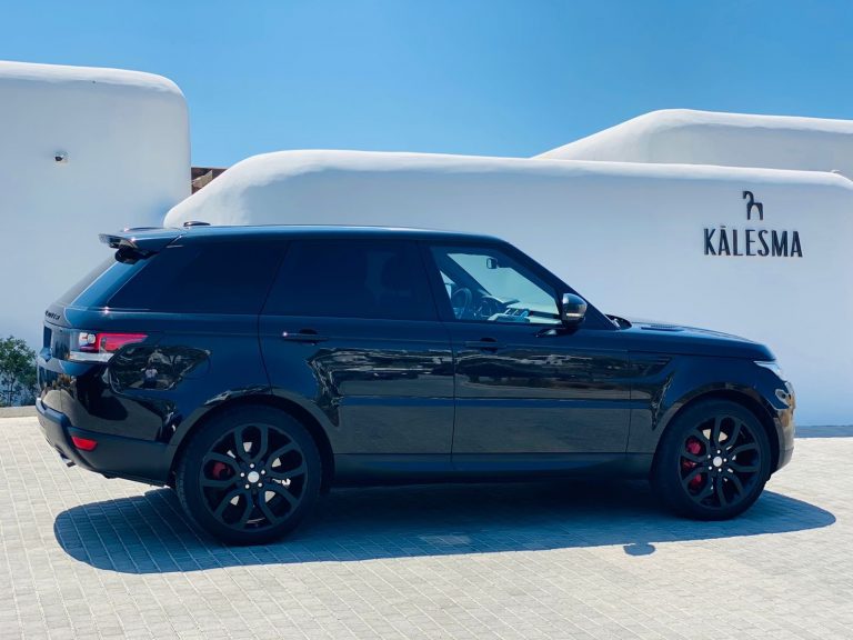 A black Range Rover from the side.